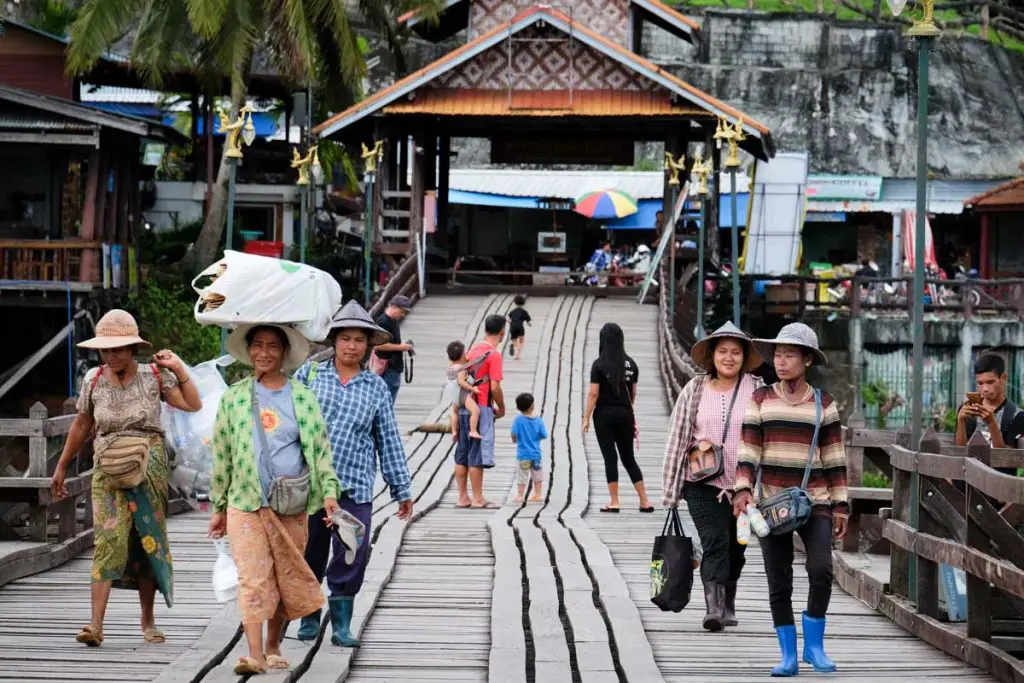 Women walking on the bridge of Sangkhlaburi, Thailand