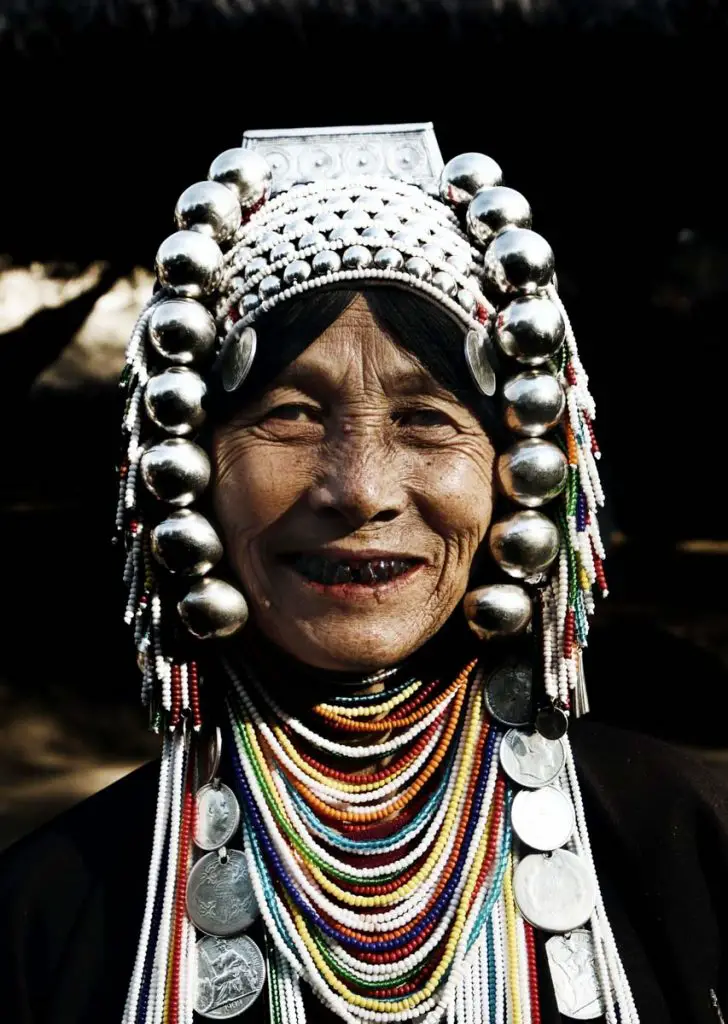 Hill tribe woman with silver headdress in Thailand
